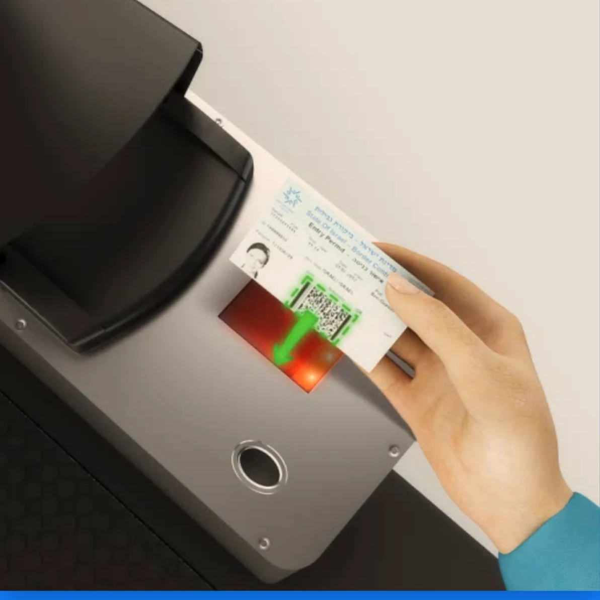 Before: a hand holding a passport over the old kiosk scanner